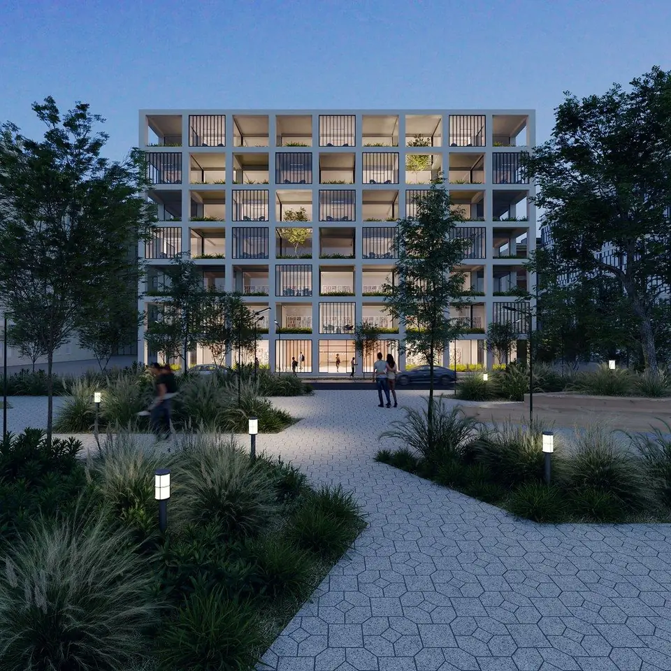 Mid-rise apartment building with a gridded facade and balconies above a landscaped courtyard at dusk, exterior render
